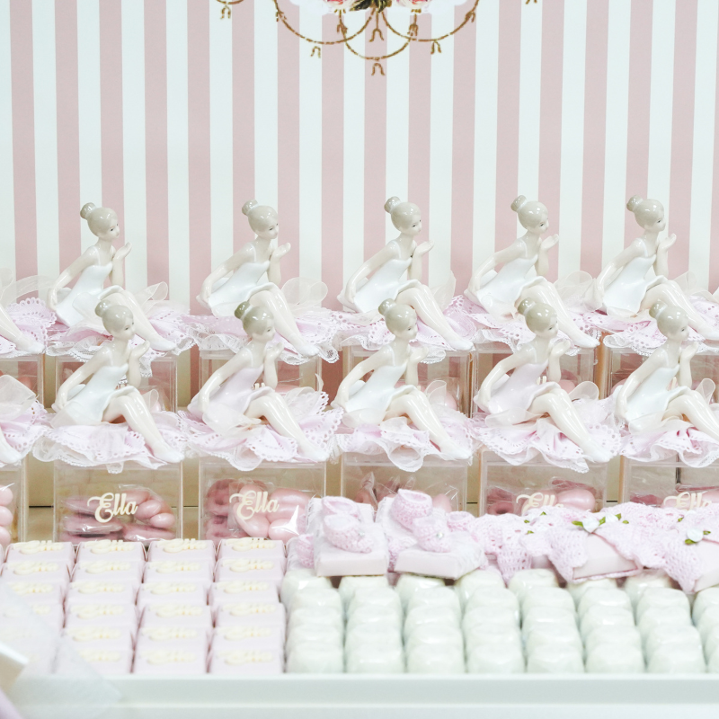 Ballerina baby girl chocolate stand arrangement with personalized backdrop.