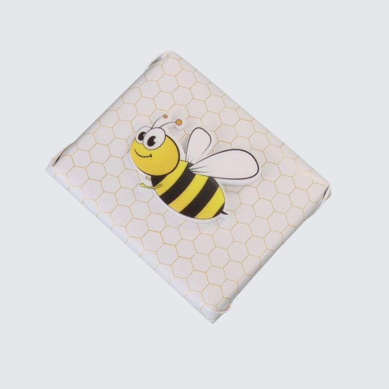 Baby bee theme personalized chocolate wood stand with personalized backdrop.