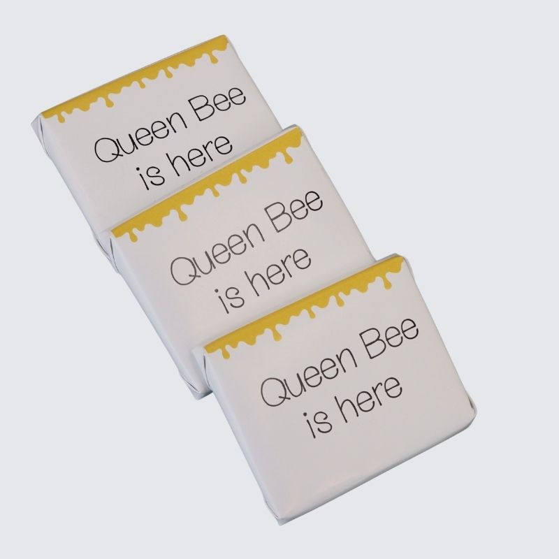 Baby bee theme personalized chocolate wood stand with personalized backdrop.