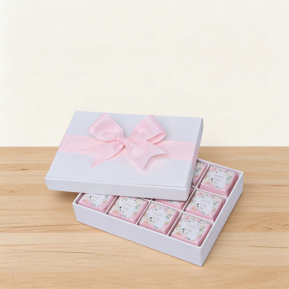 Welcome baby girl flower designed 12-piece chocolate hard box