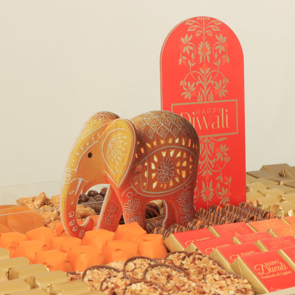 Happy Diwali with acrylic elephant decorated chocolate & sweets medium leather tray