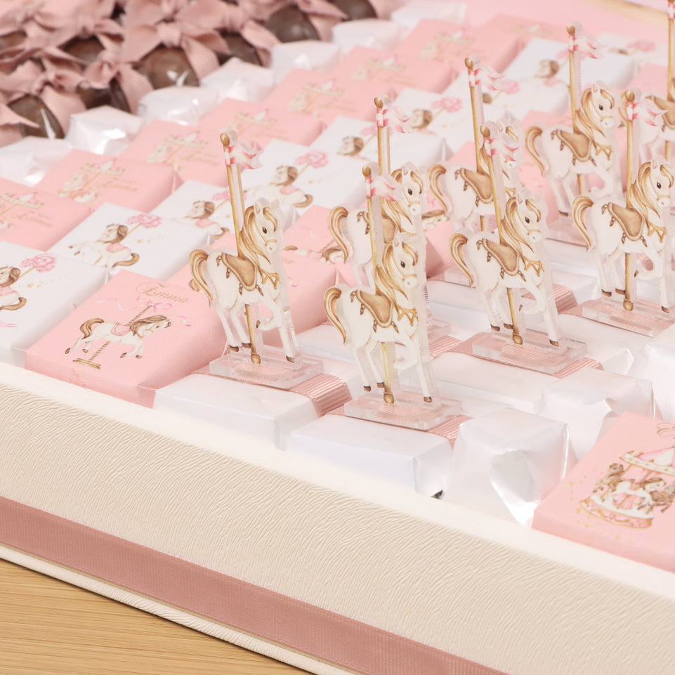 Baby girl carousel designed premium chocolate with acrylic backdrop