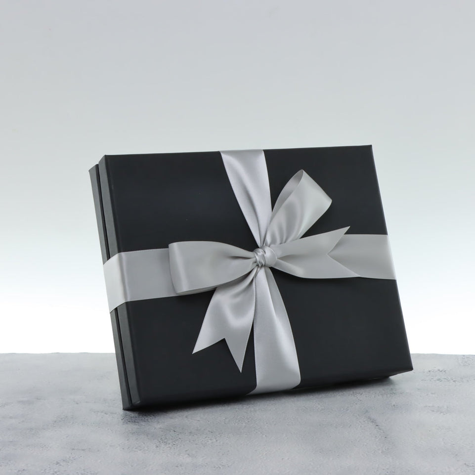 Premium chocolate 20pc black hard box with silver ribbon