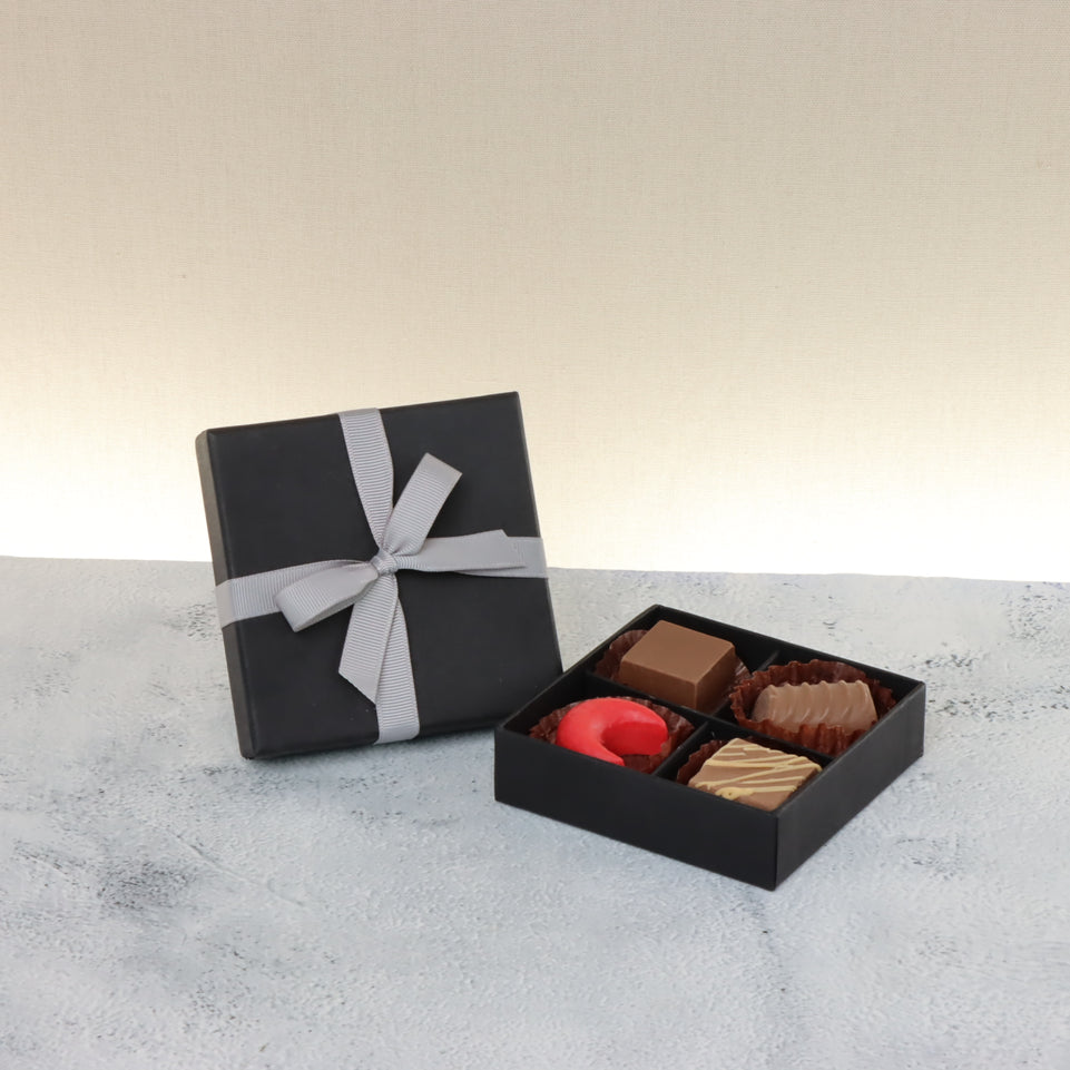 Set of 15 Premium chocolate 4-pc black hard box with silver ribbon