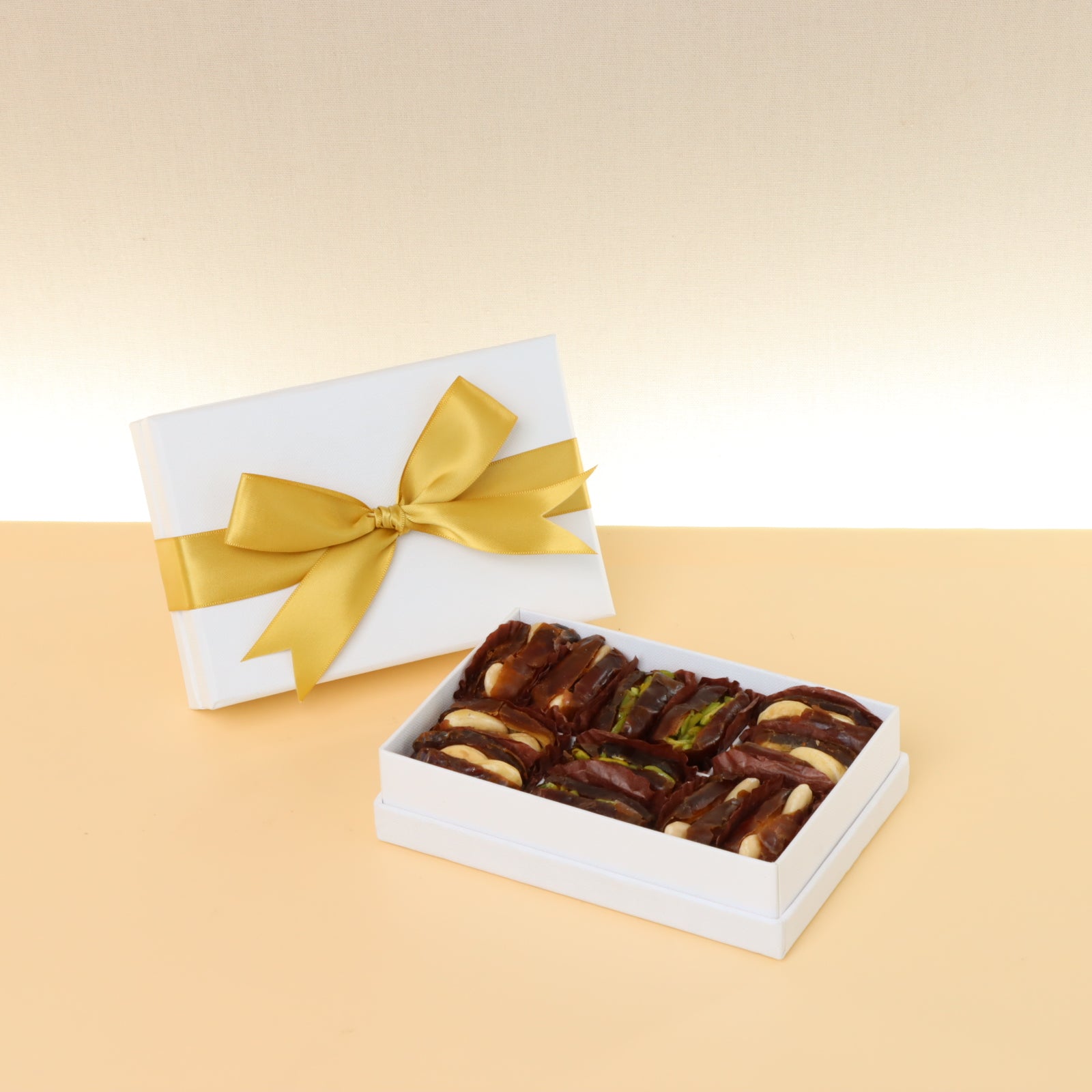 Set of 8 Premium nut stuffed dates 6-pc hard box with gold ribbon