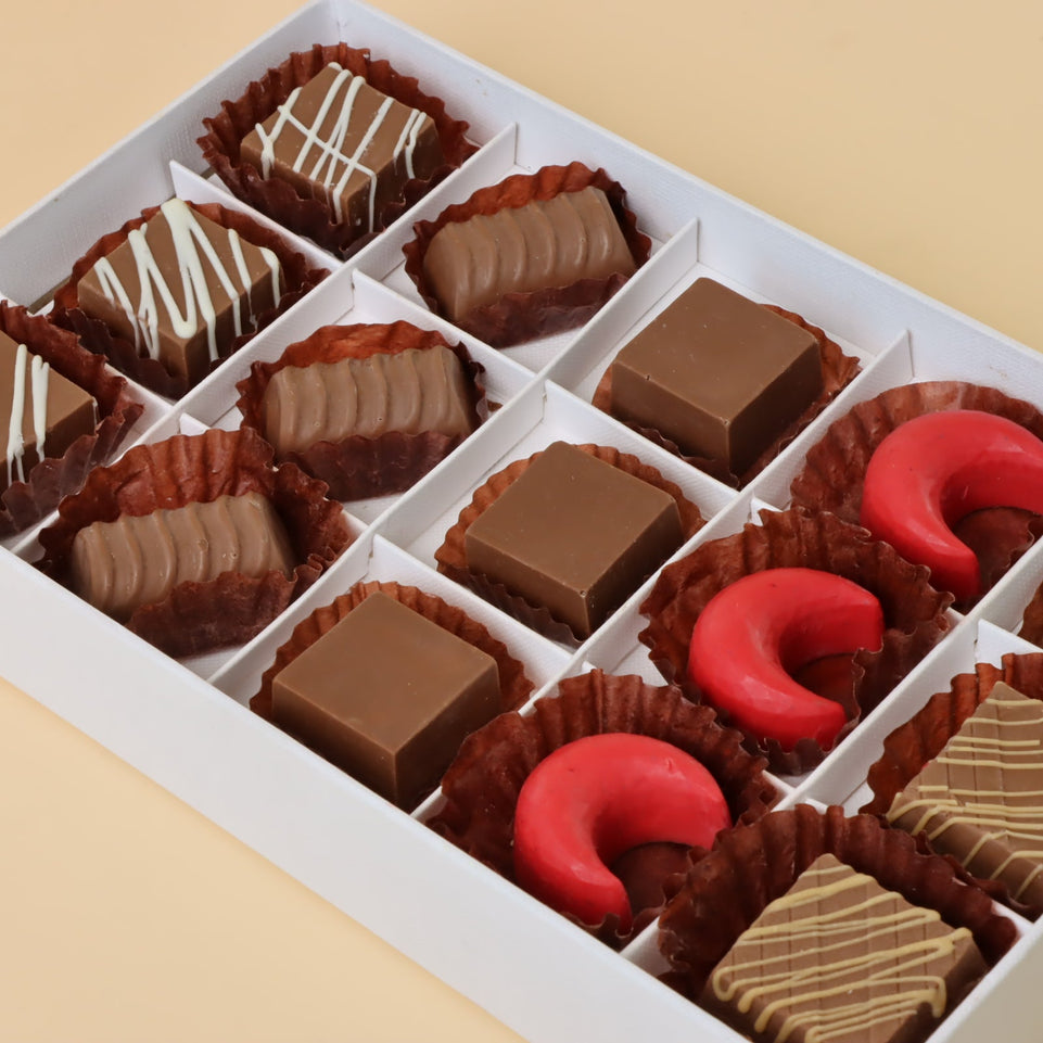 Premium chocolate 15pc white hard box with gold ribbon