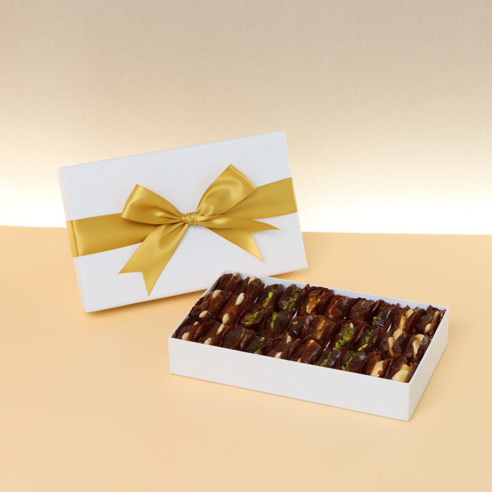 Premium nut stuffed dates white 15-pc hard box with silver ribbon