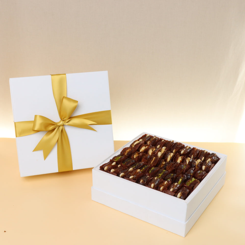 Premium nut stuffed dates one layer hard box with gold ribbon