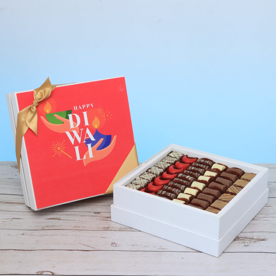 Happy diwali hands holding candle designed premium chocolate hard box