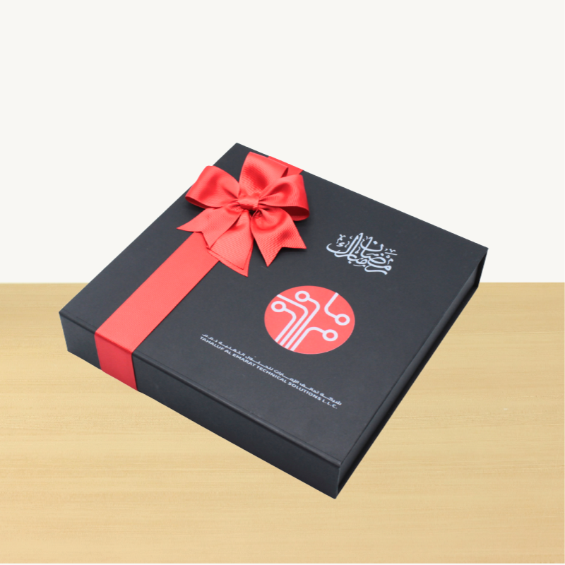 Corporate branded premium chocolate magnetic printed hard box with matching ribbon.