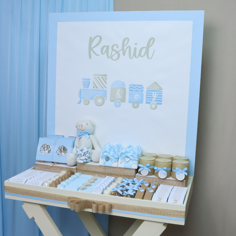 Baby teddy theme personalized chocolate wood stand with personalized backdrop.