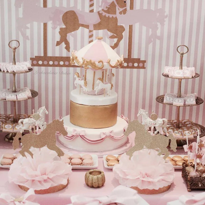Baby girl carousel theme dessert table