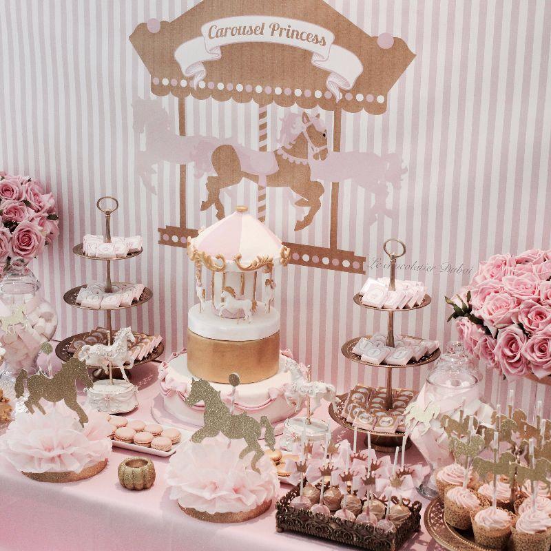 Baby girl carousel theme dessert table