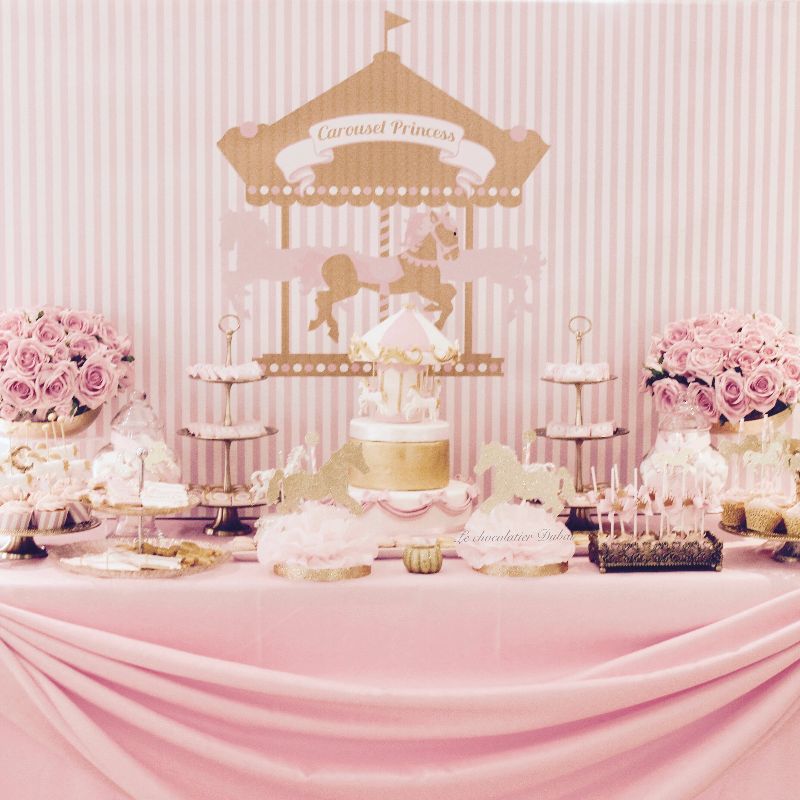 Baby girl carousel theme dessert table