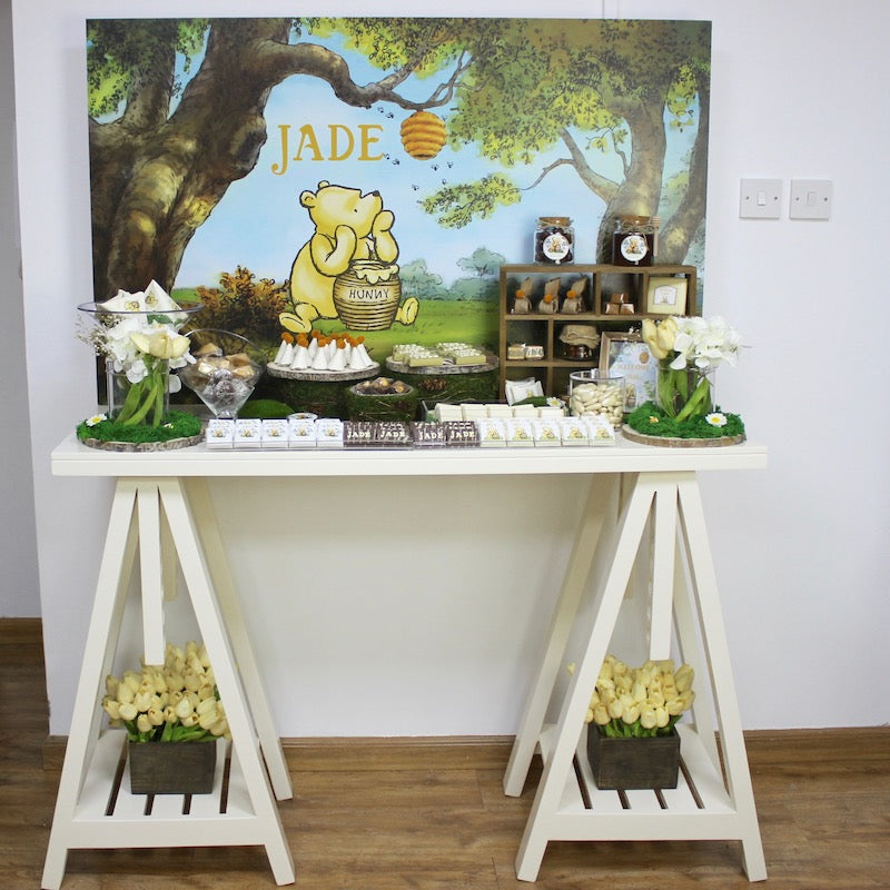 Baby boy "winnie the pooh" theme chocolate wood stand for rent.