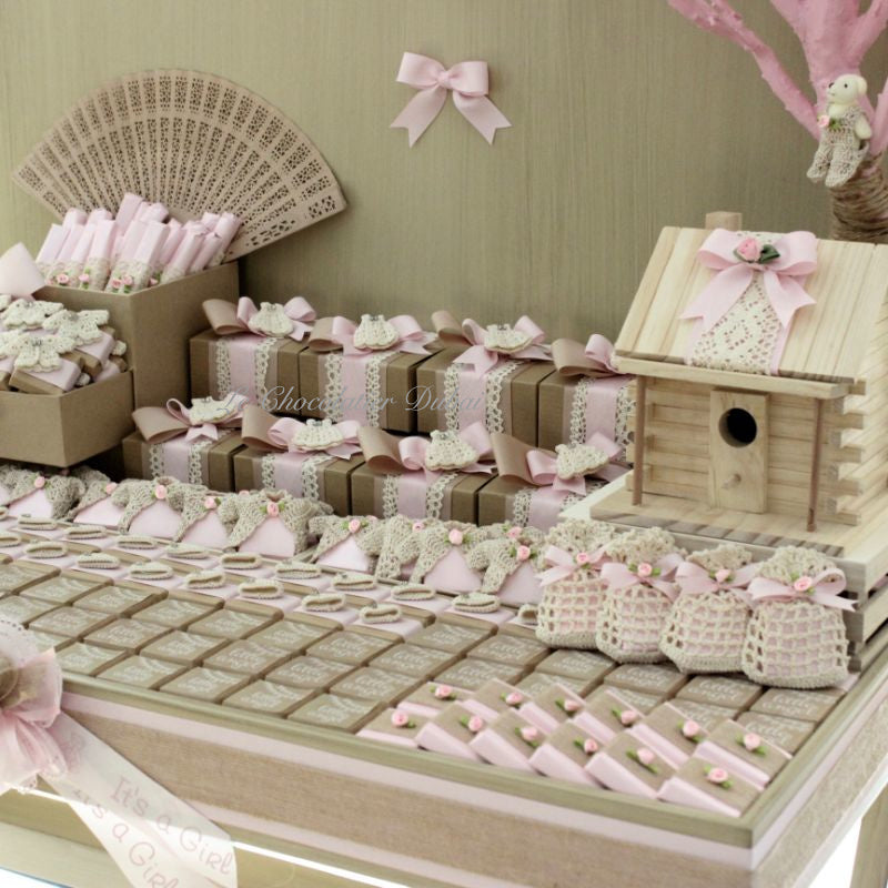 Baby rustic theme crochet decorated chocolate wood stand with customized backdrop.