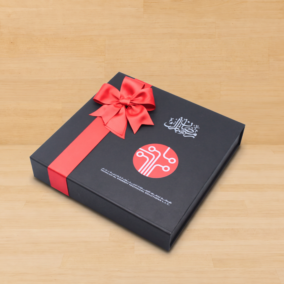 Corporate branded premium chocolate magnetic printed hard box with matching ribbon.