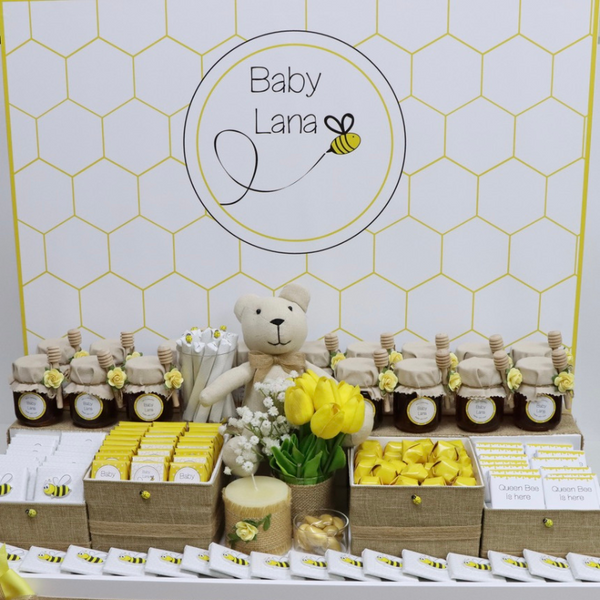Baby bee theme personalized chocolate wood stand with personalized backdrop.