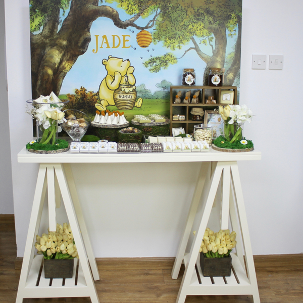 Baby boy "winnie the pooh" theme chocolate wood stand for rent.