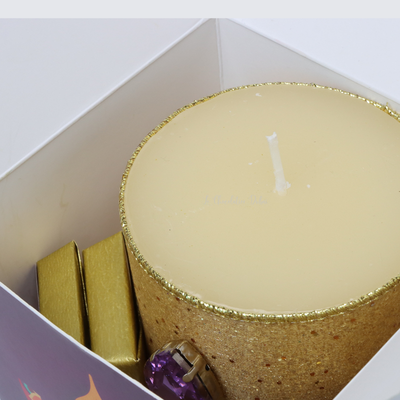 Diwali decorated candle and chocolate giveaway box