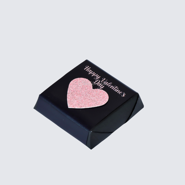 Happy valentine's pink glittery decorated chocolate