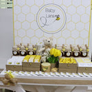 Baby bee theme personalized chocolate wood stand with personalized backdrop.
