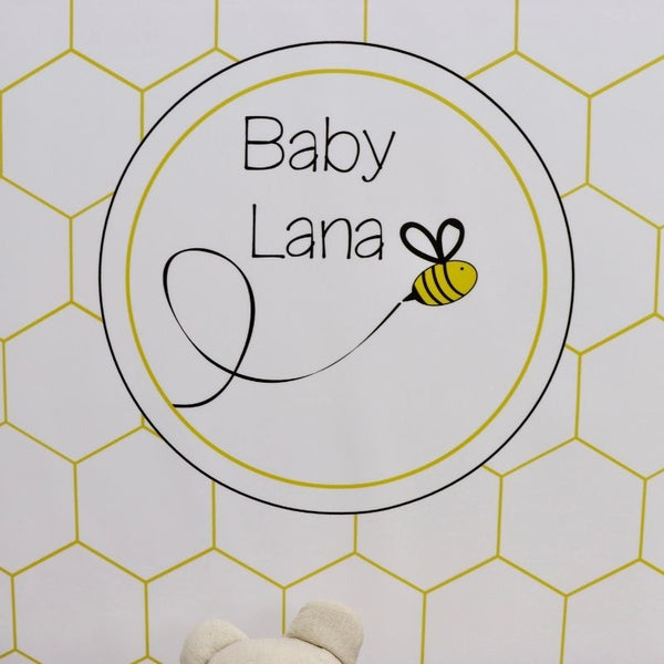Baby bee theme personalized chocolate wood stand with personalized backdrop.