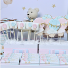 Baby twin designed air balloon theme chocolate arrangement stand with personalized backdrop.