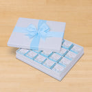 Baby boy "welcome baby" flower designed 20-piece chocolate hard box