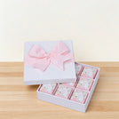 Welcome baby girl flower designed 9-piece chocolate hard box