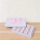 Welcome baby girl flower designed 15-piece chocolate hard box