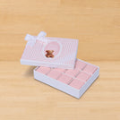Welcome baby girl teddy designed 12-piece chocolate hard box