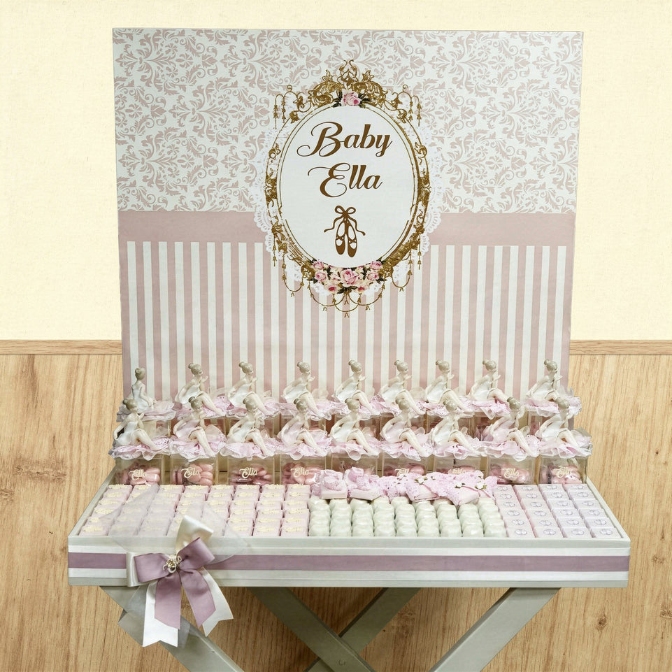 Ballerina baby girl chocolate stand arrangement with personalized backdrop.