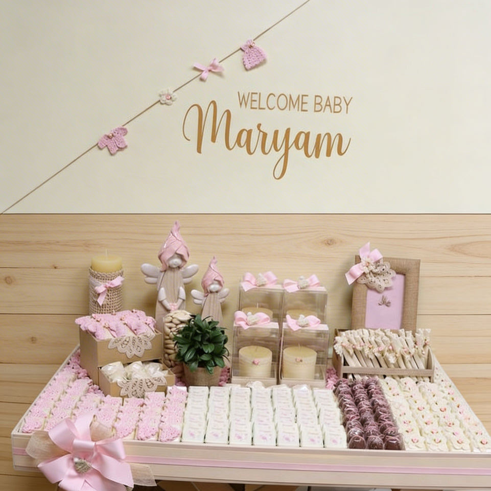 Baby crochet decorated and personalized chocolate wood stand with personalized backdrop.