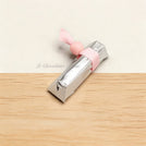 Bead decorated loose chocolate stick
