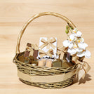 Flower decorated chocolate and delights and honey jar basket