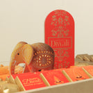Happy diwali with acrylic elephant decorated chocolate & sweets large leather tray