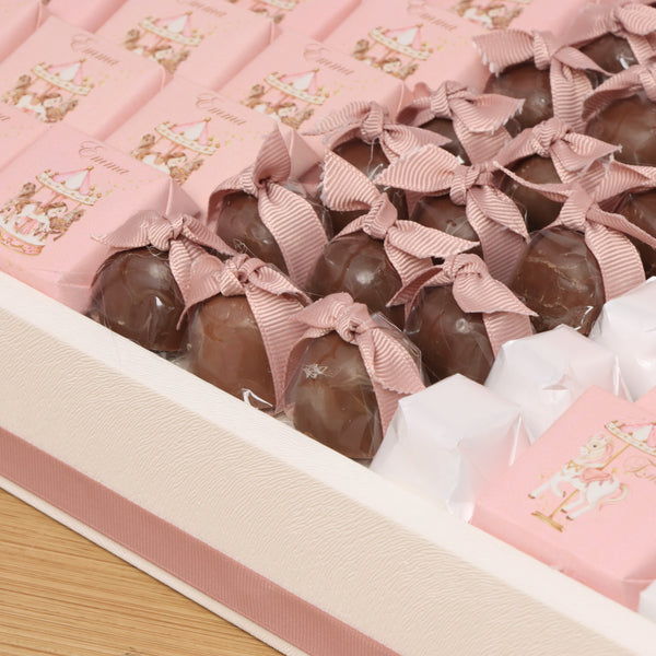 Baby girl carousel designed premium chocolate with acrylic backdrop