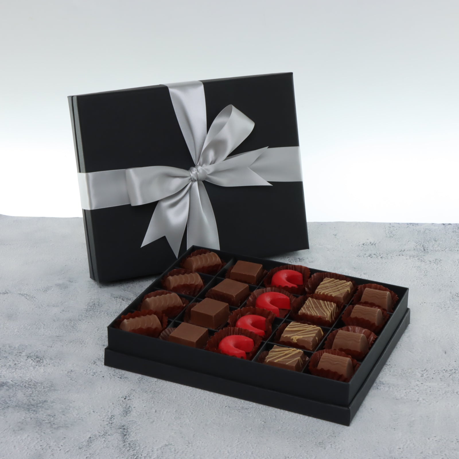 Premium chocolate 20pc black hard box with silver ribbon
