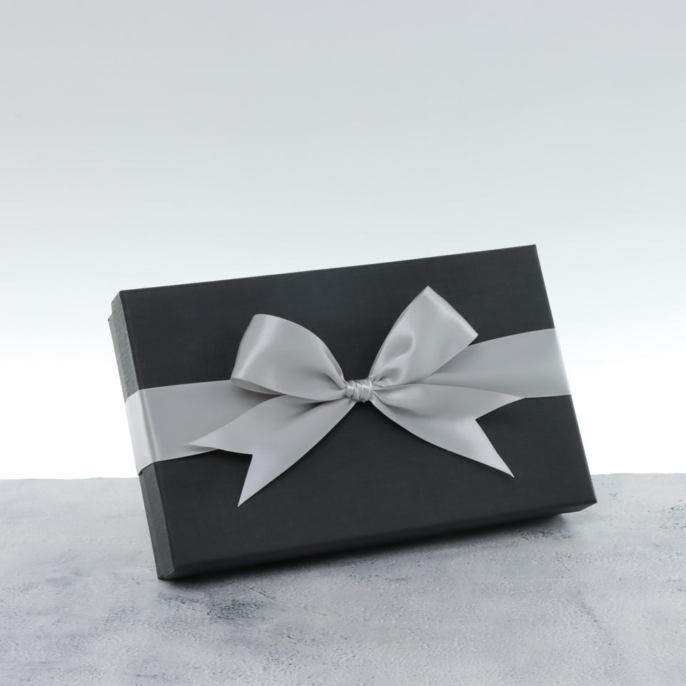 Premium chocolate 15-pc black hard box with silver ribbon