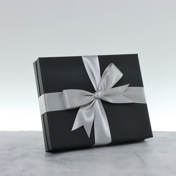 Premium chocolate 20pc black hard box with silver ribbon