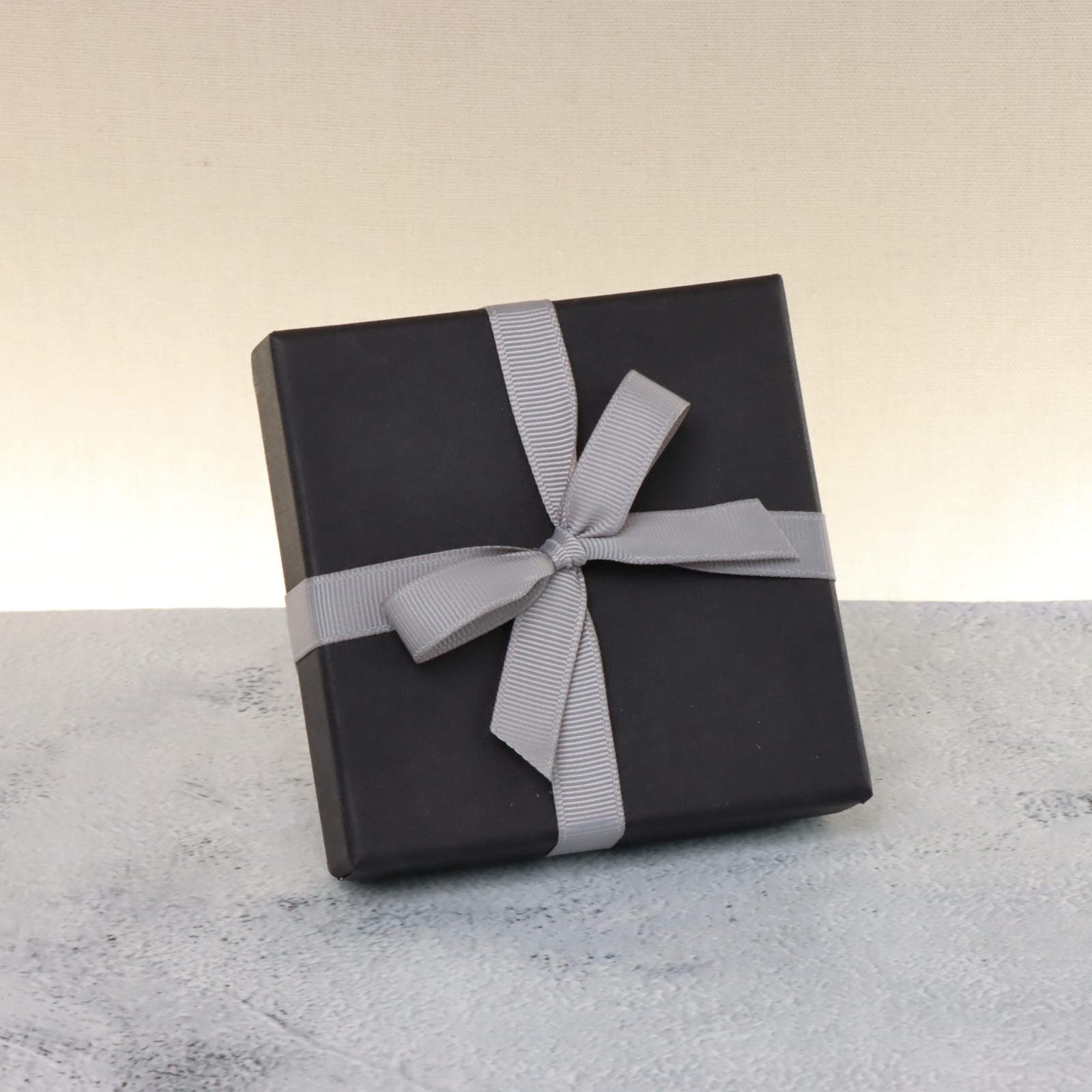 Set of 15 Premium chocolate 4-pc black hard box with silver ribbon