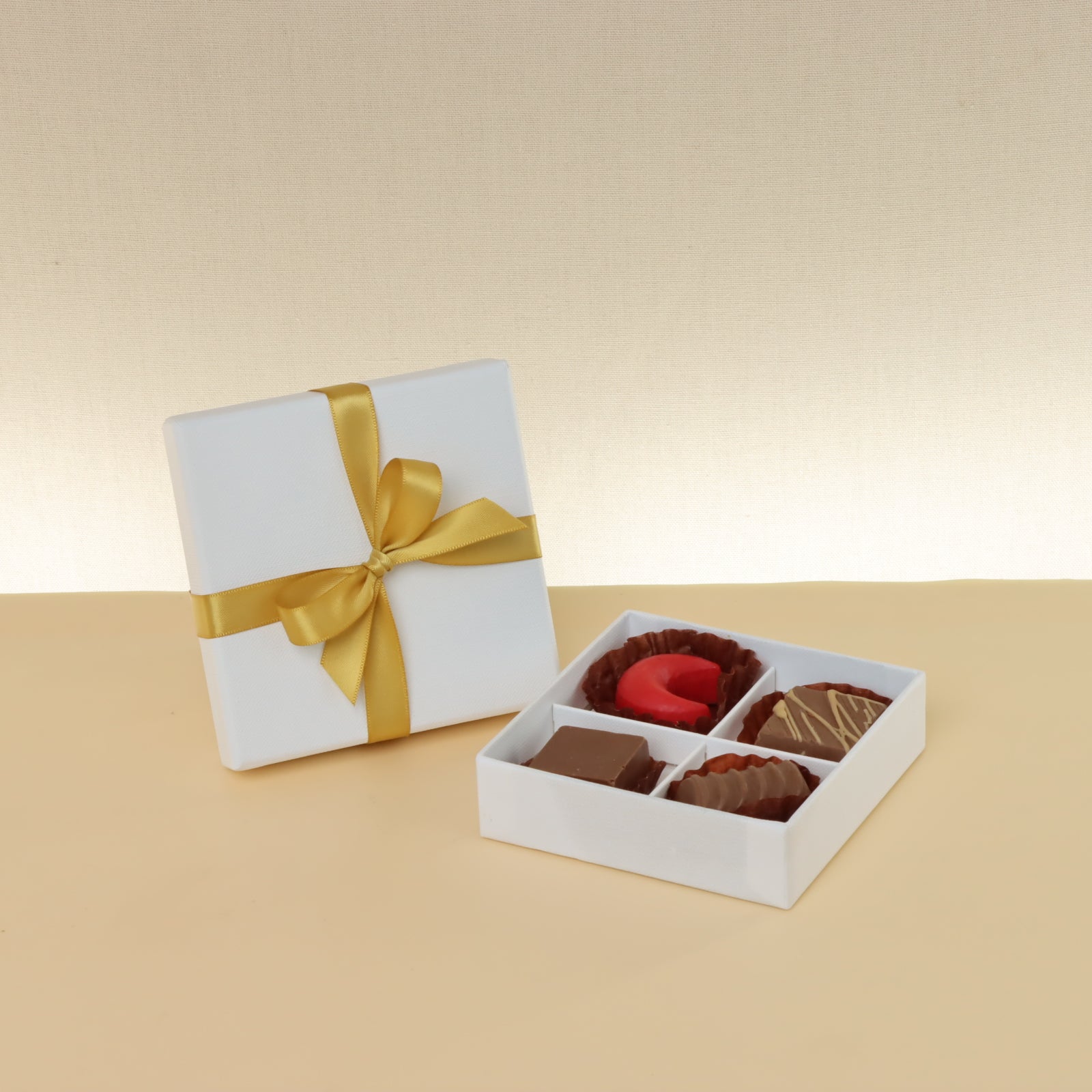 Set of 15 Premium chocolate 4pc white hard box with gold ribbon