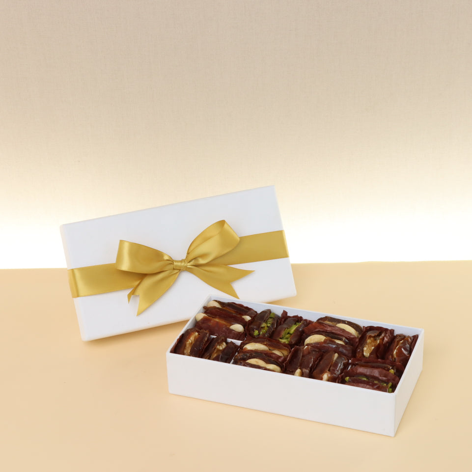 Premium nut stuffed dates 8-pc hard box with gold ribbon