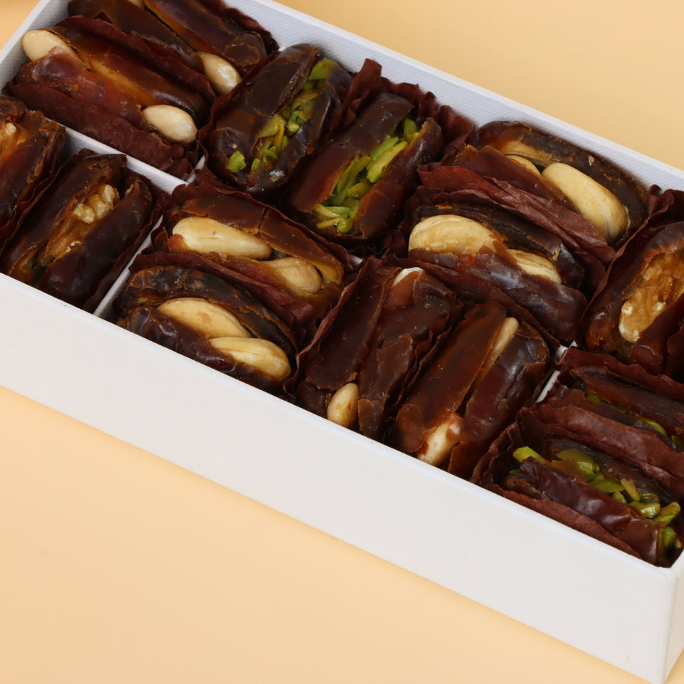 Premium nut stuffed dates 8-pc hard box with gold ribbon