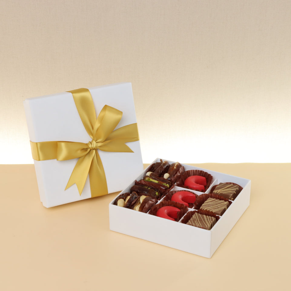 Premium chocolate & dates 9-pc hard box with gold ribbon