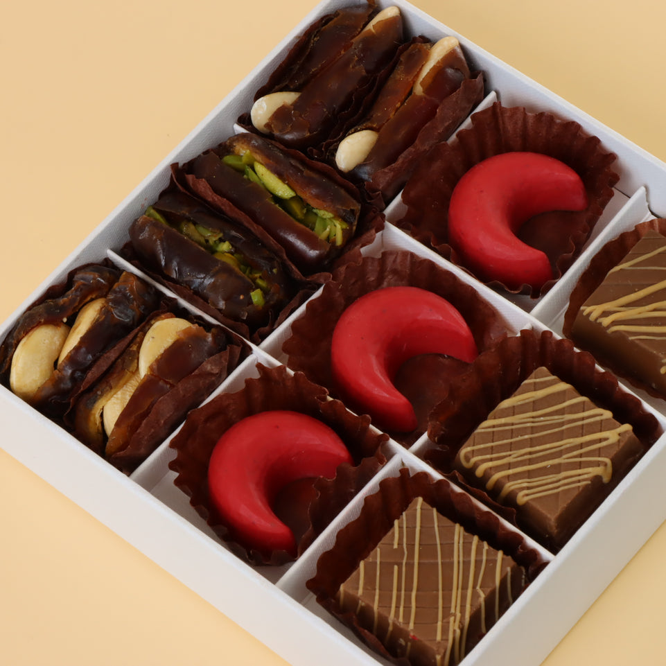 Premium chocolate & dates 9-pc hard box with gold ribbon