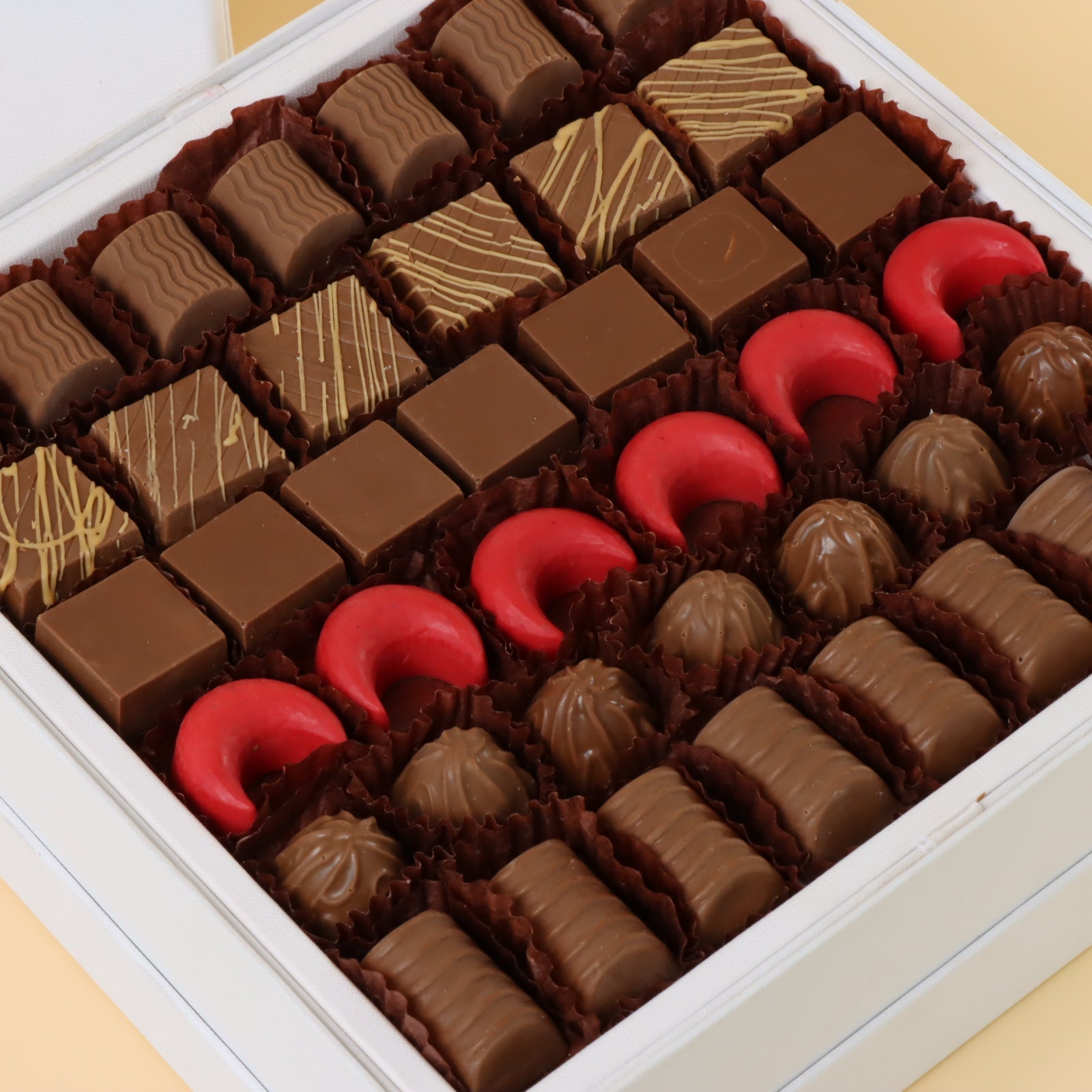 Premium chocolate one layer hard box with gold ribbon