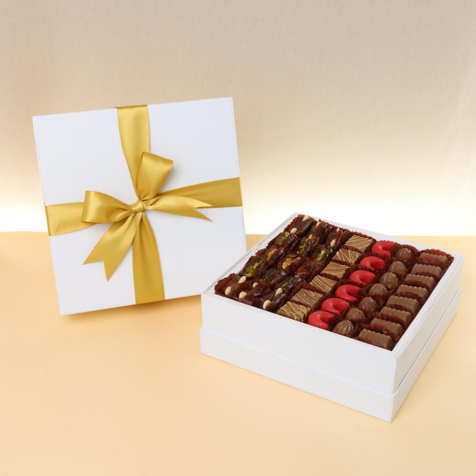 Premium chocolate & dates 500g hard box with gold ribbon