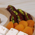 Ramadan Kareem premium chocolate , sweets, nuts crescent wooden tray